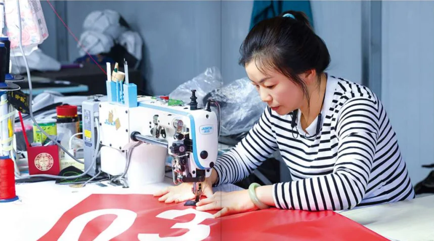 Sewing line producing printed training equipment